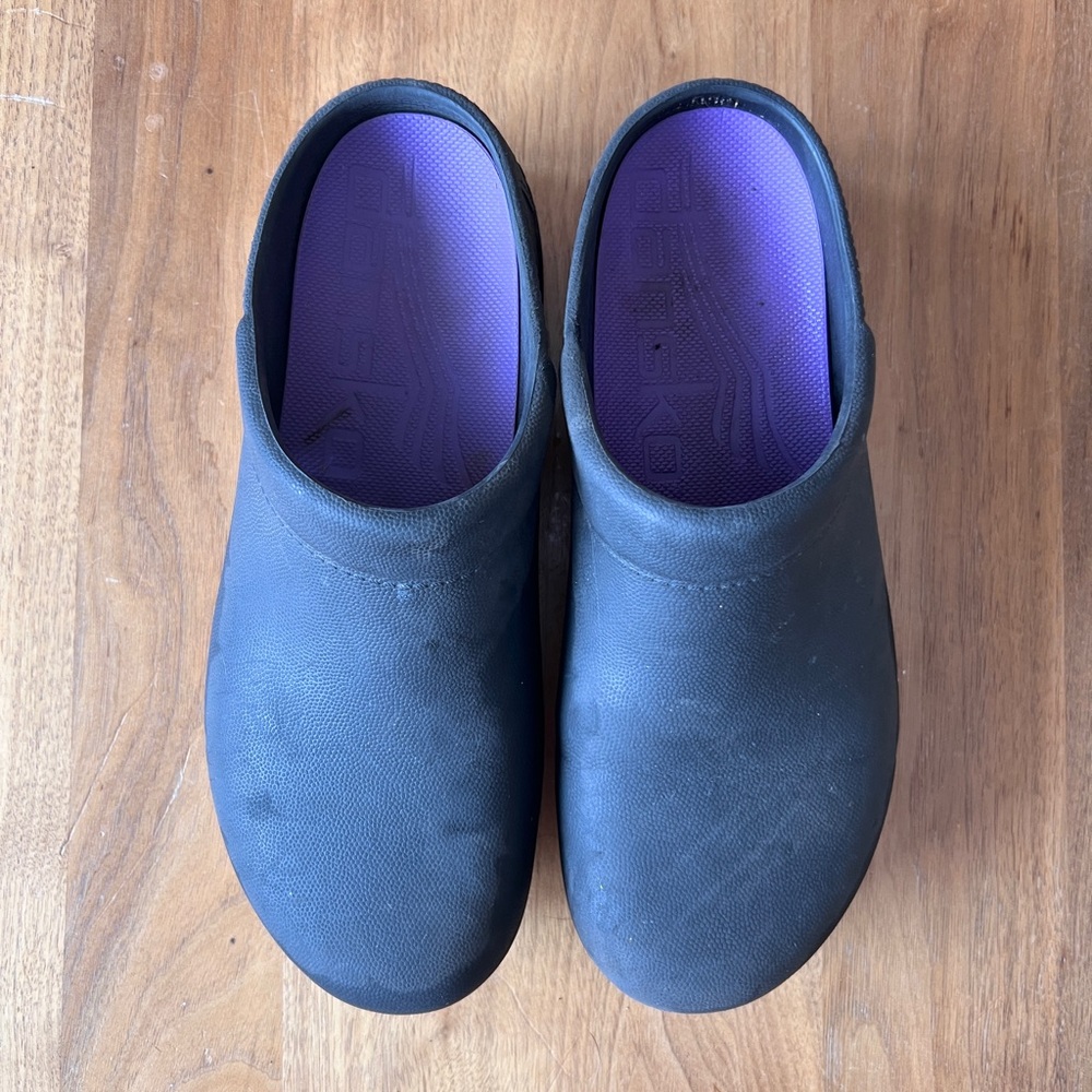 Dansko Kane Black Mules with Purple Insole